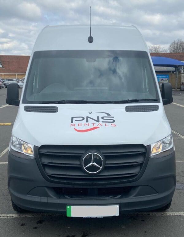 A white van with the name pns on it.