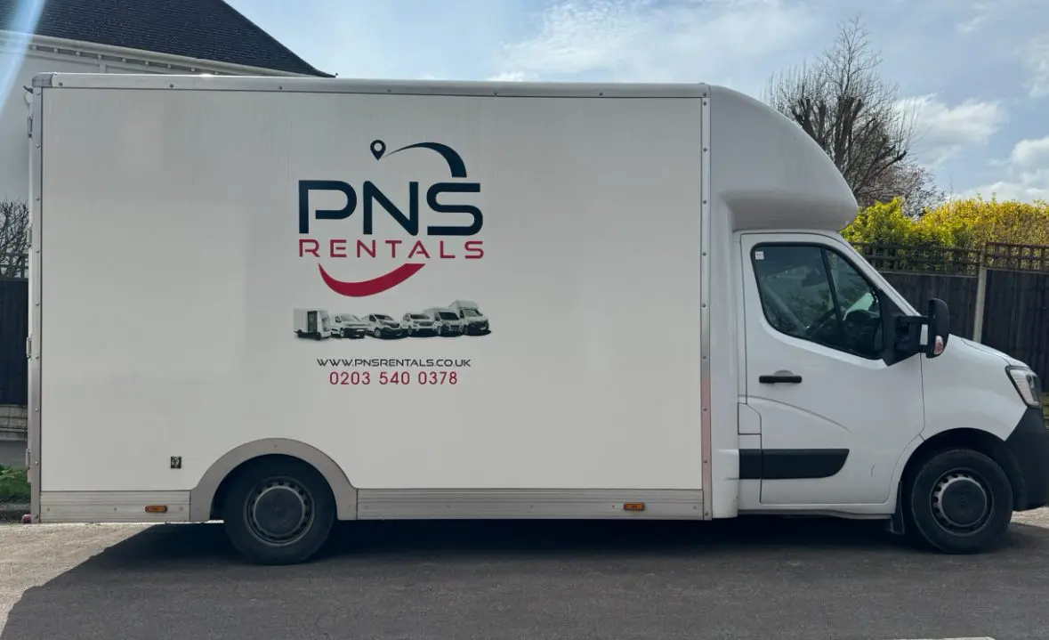 A white truck with the pns rentals logo on it.